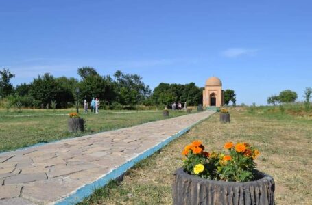 FLOWERS AND FRUIT TREES ARE PLANTED NEAR THE GAUHAR ANA MAUSOLEUM